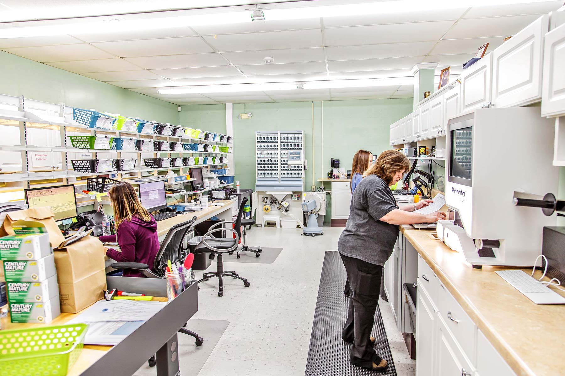 Wolfe's team works on fulfilling prescriptions for their patients